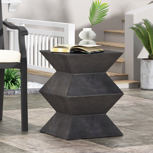 Charcoal geometric outdoor accent table with stacked hexagonal design