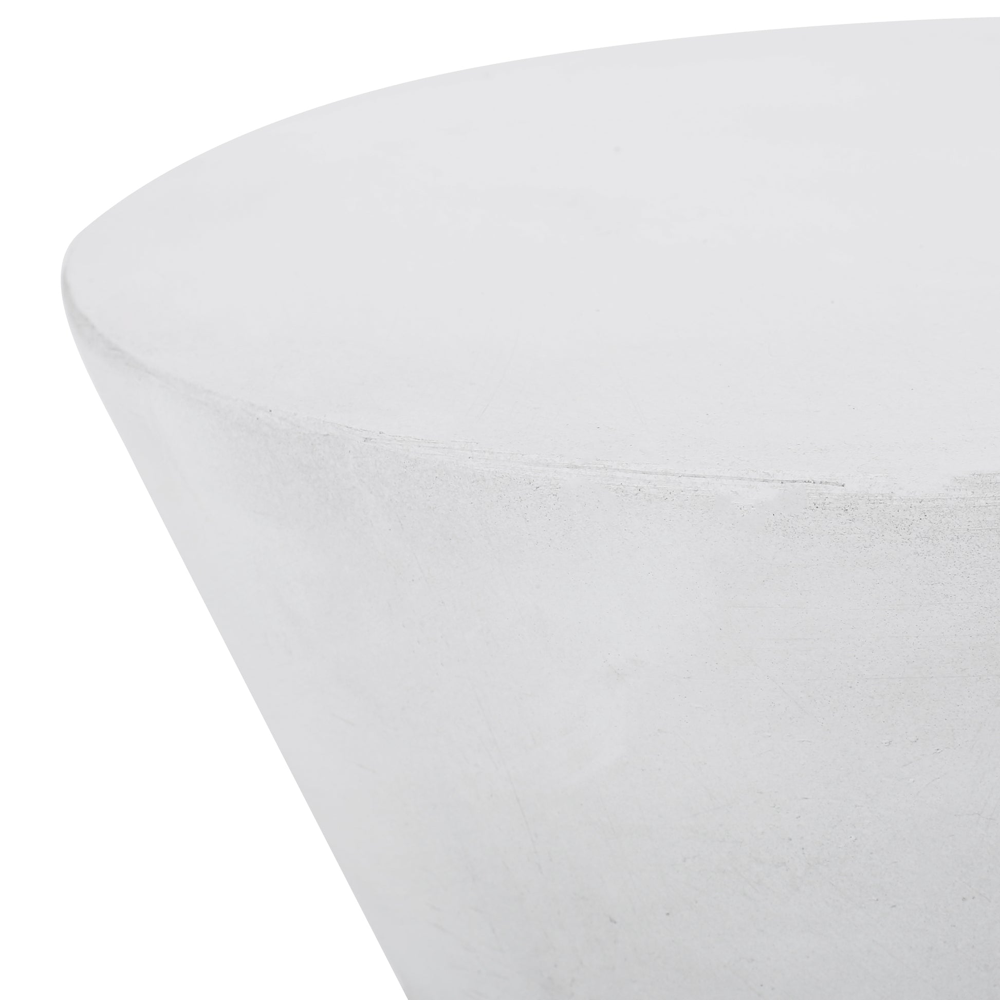 Closeup of a smooth white concrete planter with a subtle texture perfect for modern decor