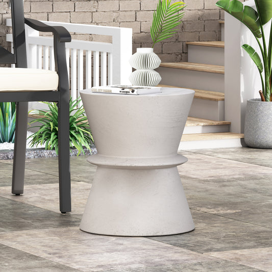 Modern hourglassshaped outdoor accent table light gray concrete finish perfect for patios