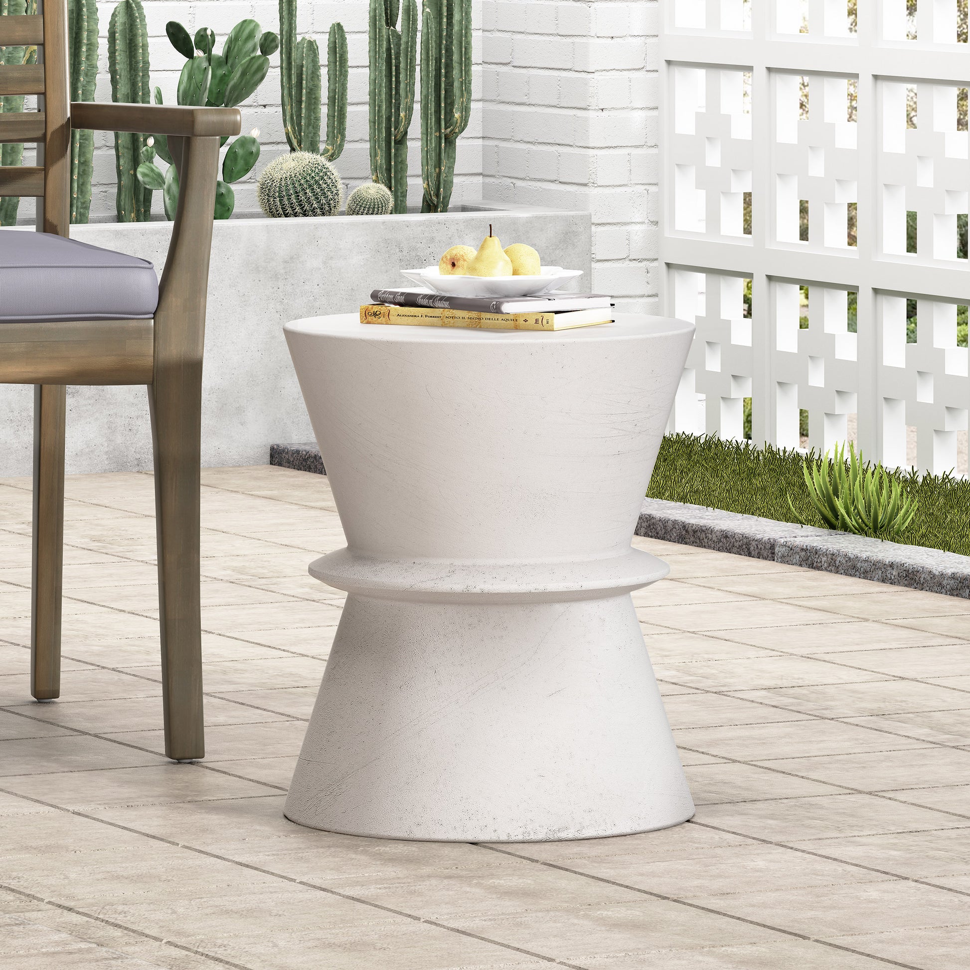 White hourglass patio accent table with textured finish