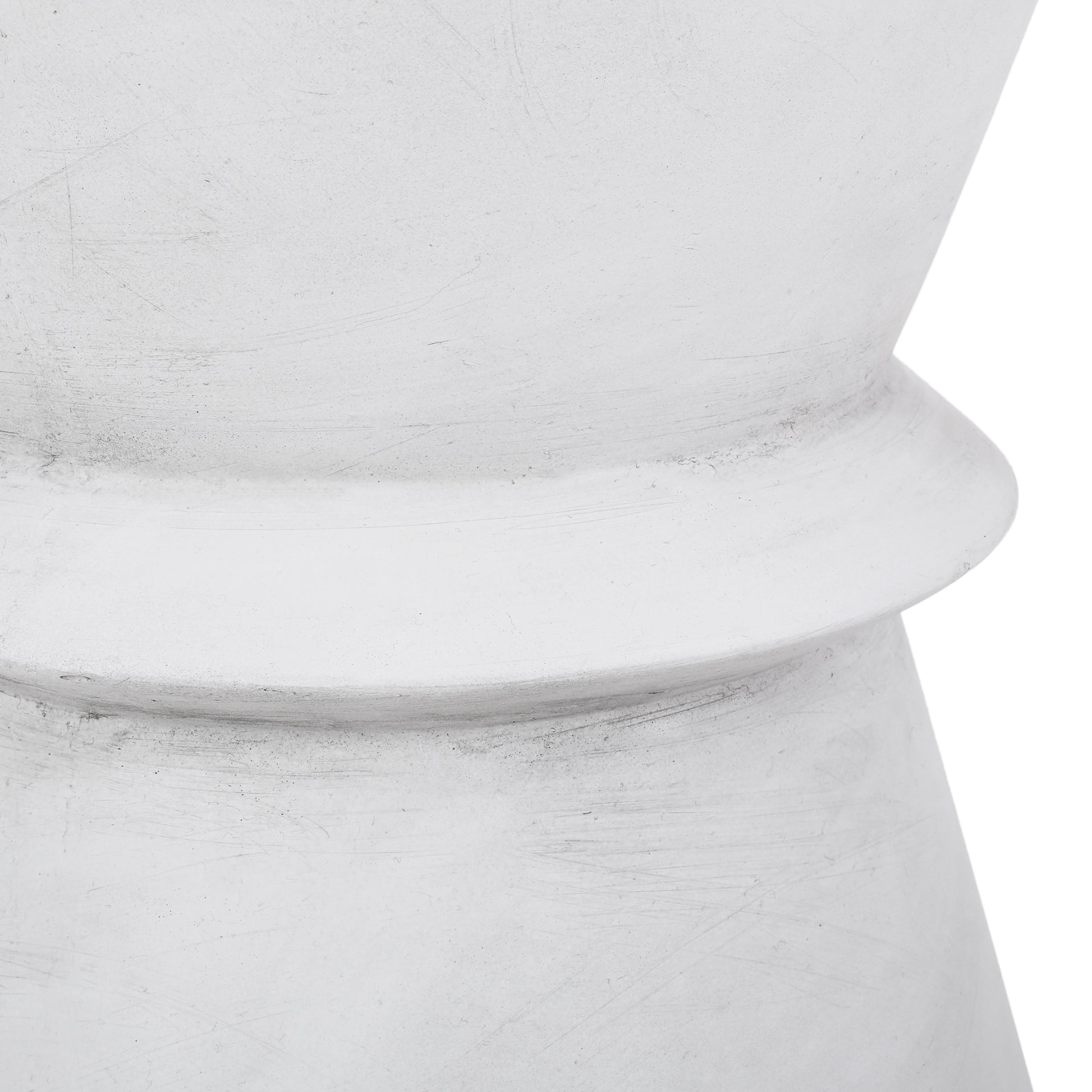 Textured white ceramic planter with a subtle matte finish and a flared lip
