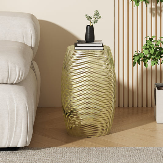 Gold perforated metal accent table with books and vase