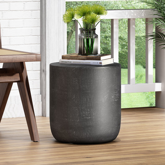 Round dark grey textured accent table with faux stone finish
