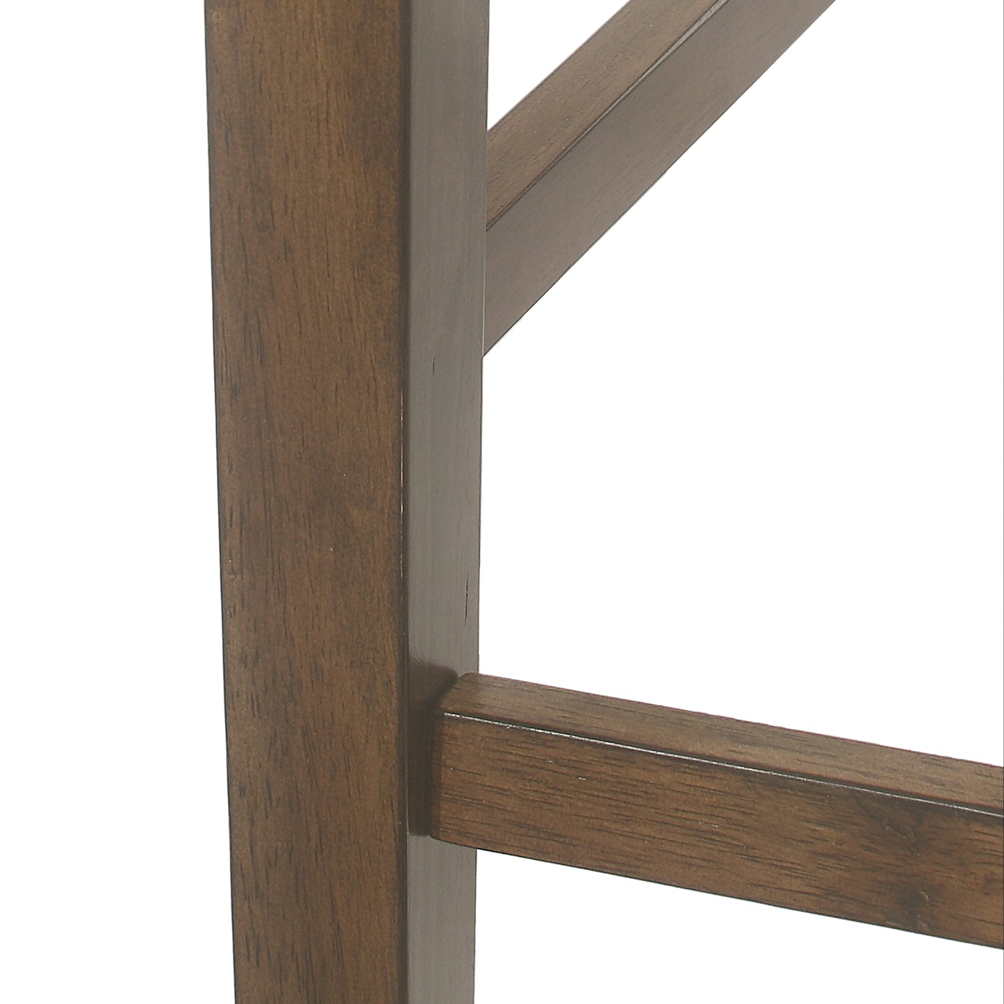 Closeup of dark brown wooden furniture leg with visible grain texture