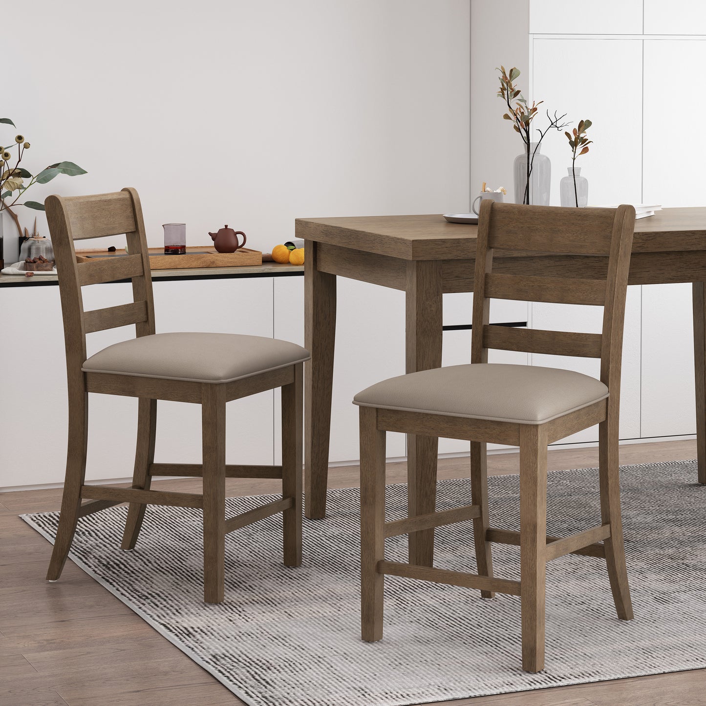 Two rustic wooden bar stools with neutral upholstered seats in a modern kitchen