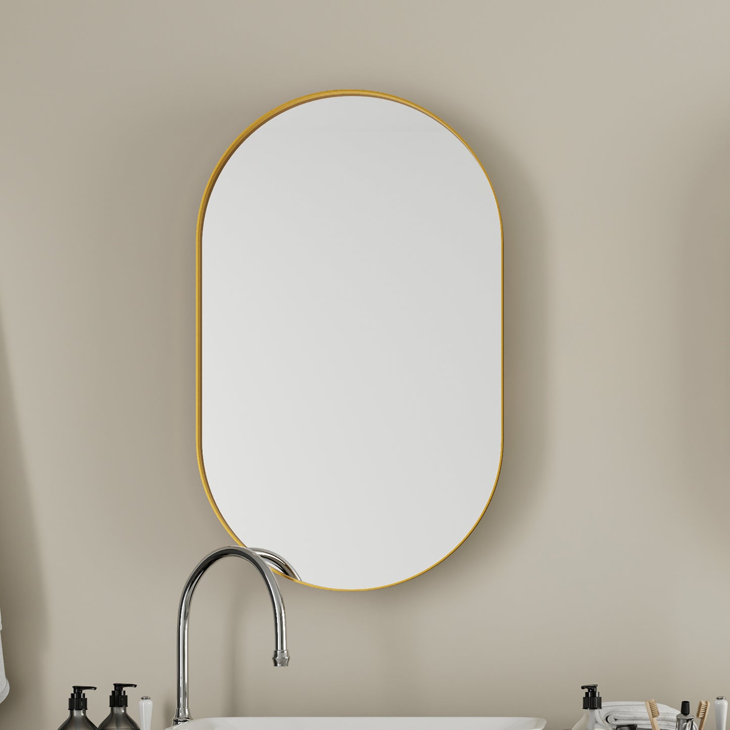 Minimalist oval bathroom mirror with a sleek gold frame perfect for modern decor