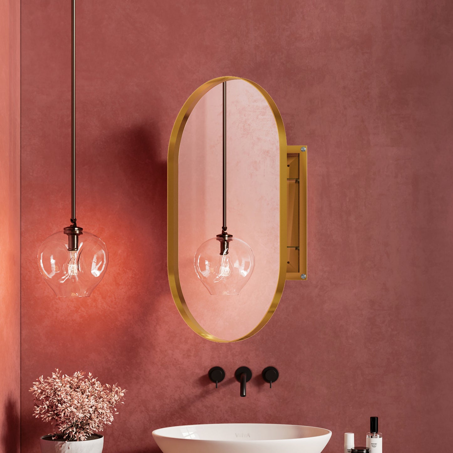 Modern brassframed oval vanity mirror with pinktinted glass and a hanging pendant light