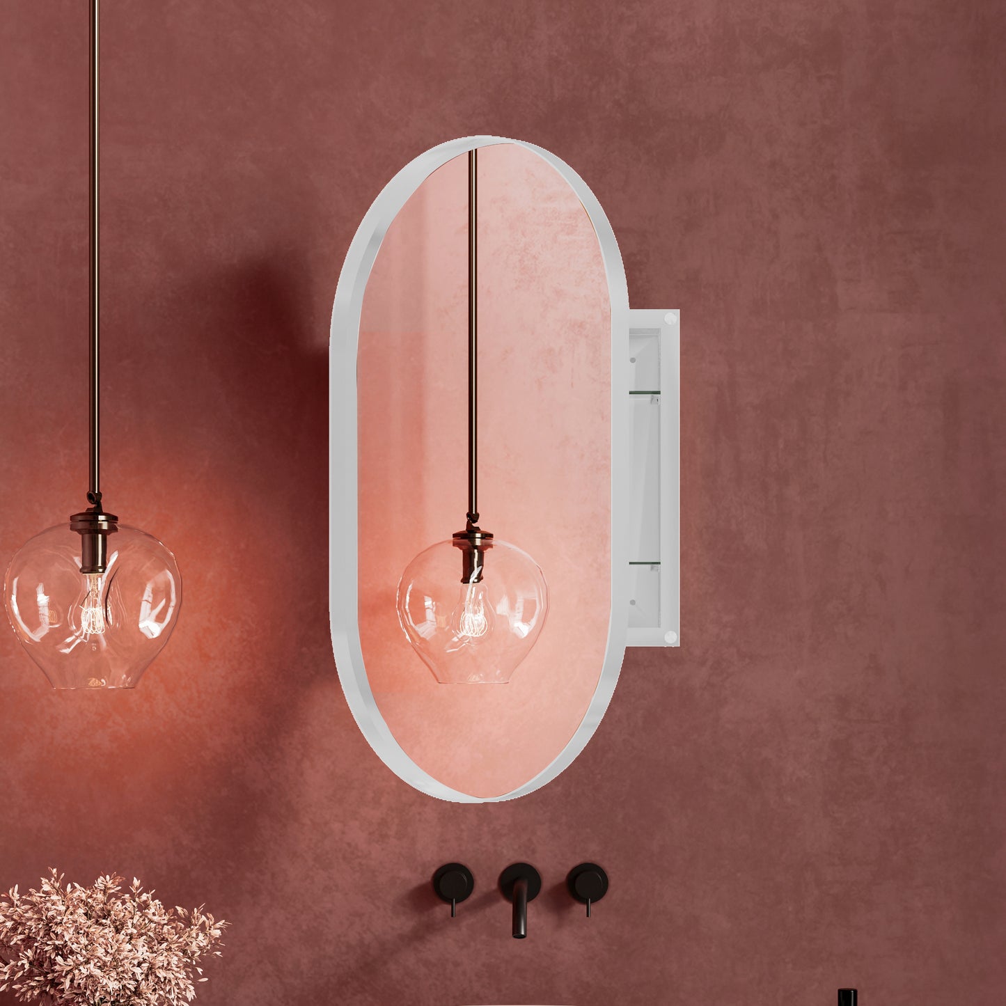 Oval bathroom mirror with recessed medicine cabinet and brass pendant light