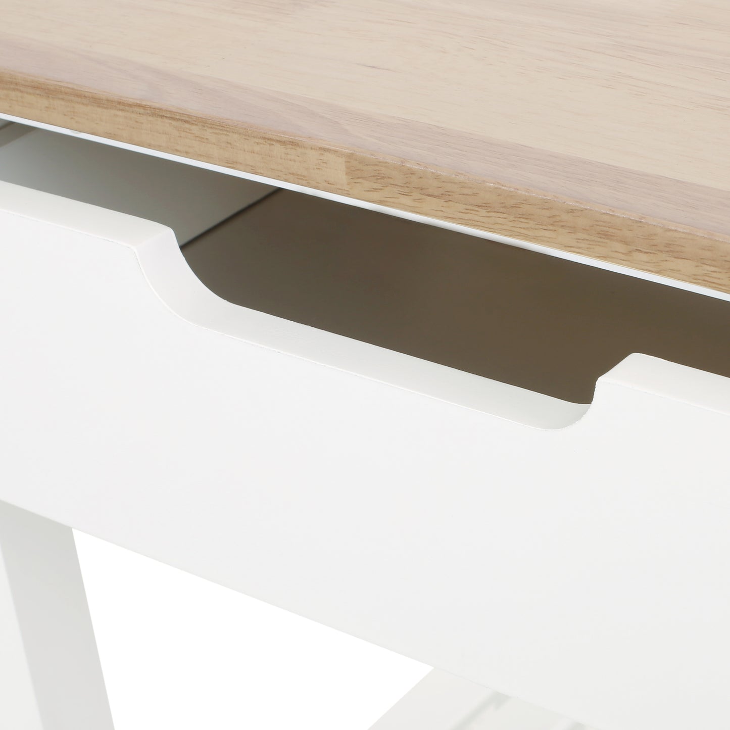 White dresser drawer detail with light wood top