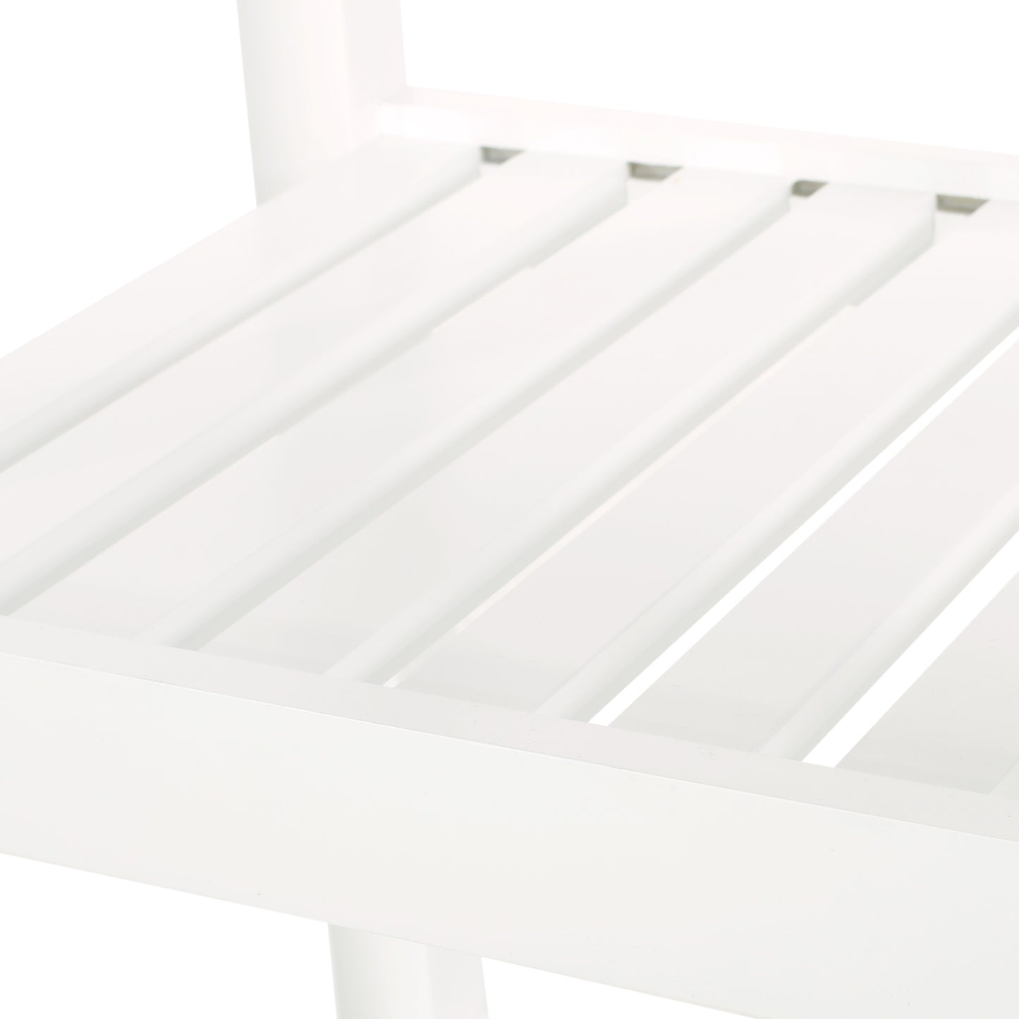 Closeup of white slatted shelf