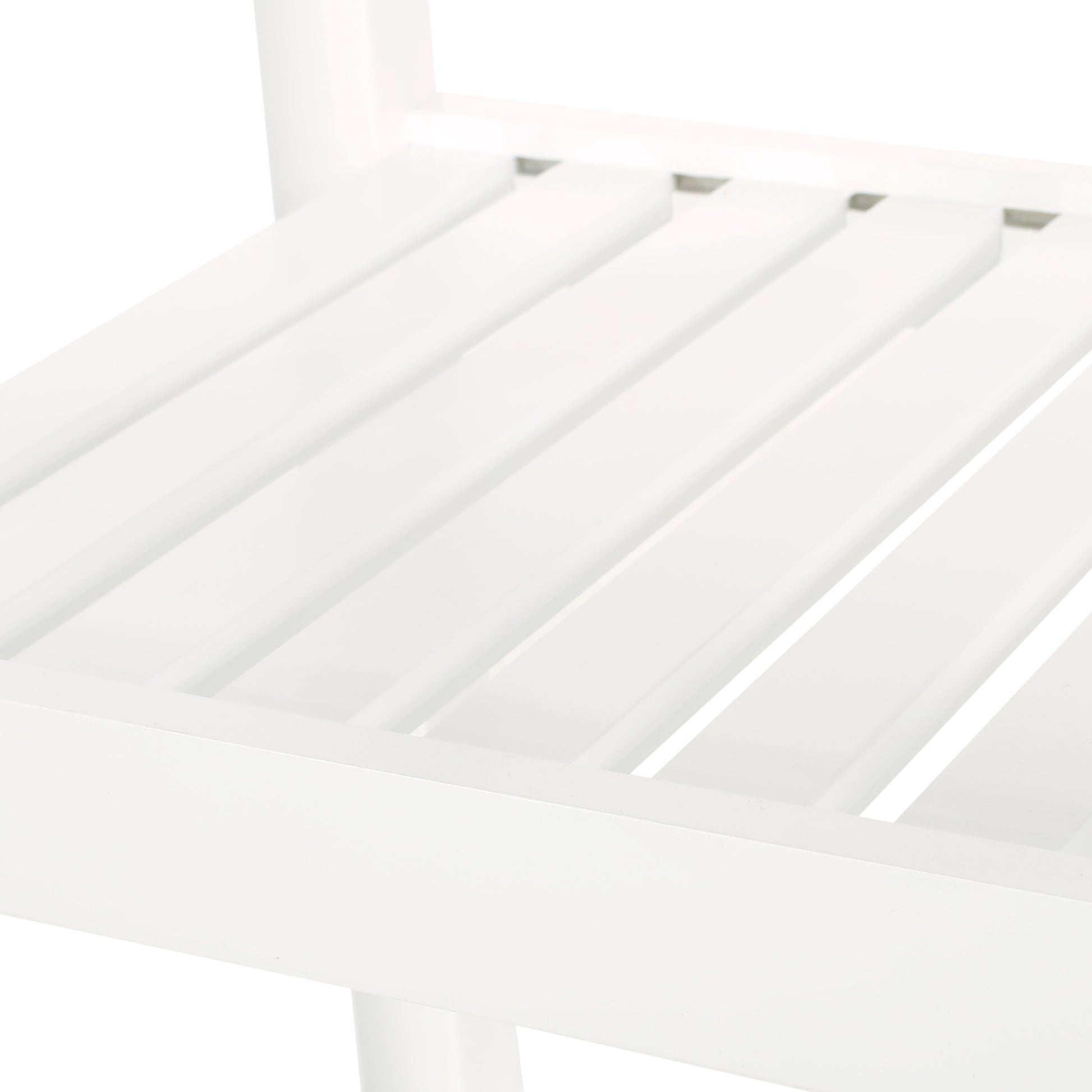Closeup of white slatted shelf