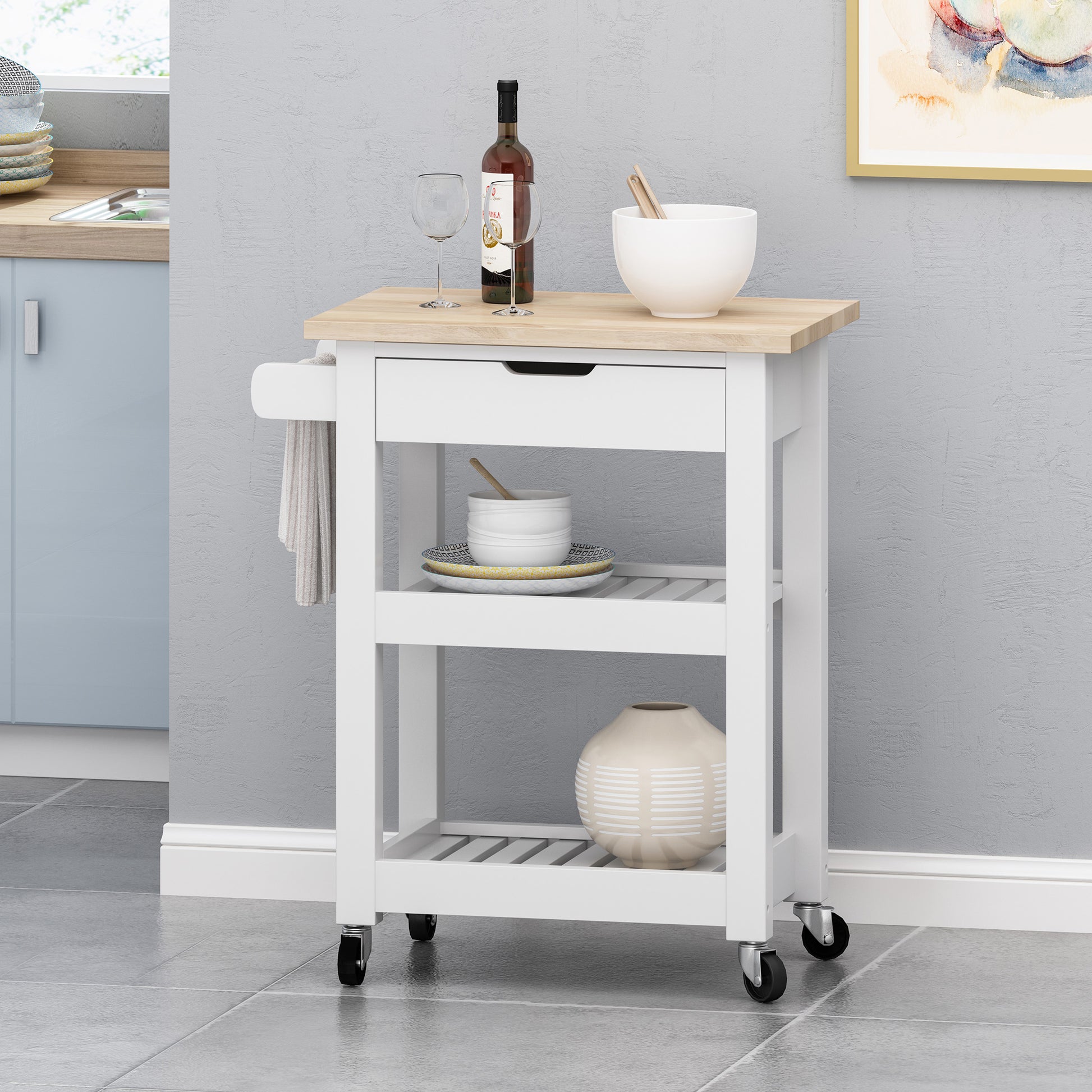 White kitchen cart with wooden top and rolling wheels
