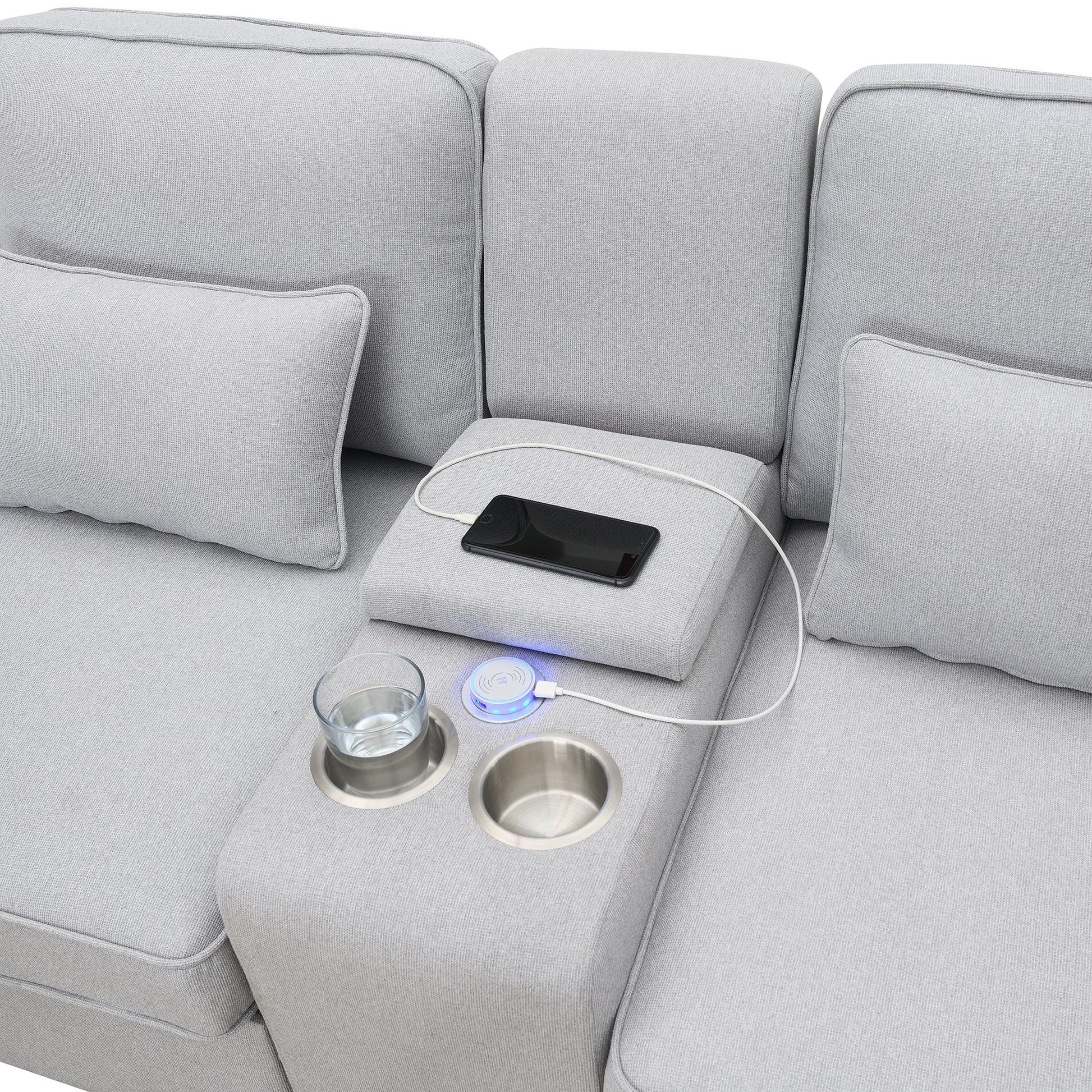 Grey sectional sofa with builtin wireless charging pad and cup holders