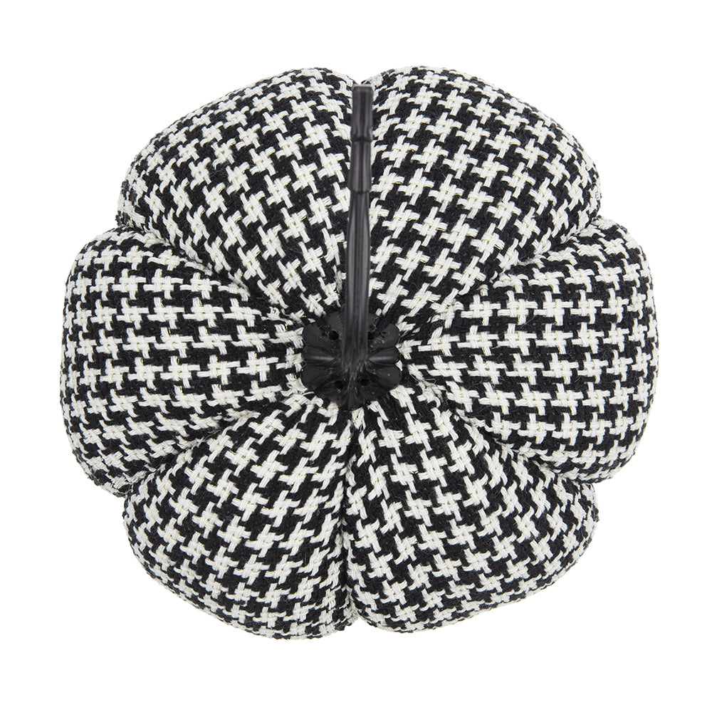 Black and white houndstooth fabric pumpkin decoration with a dark stem and base