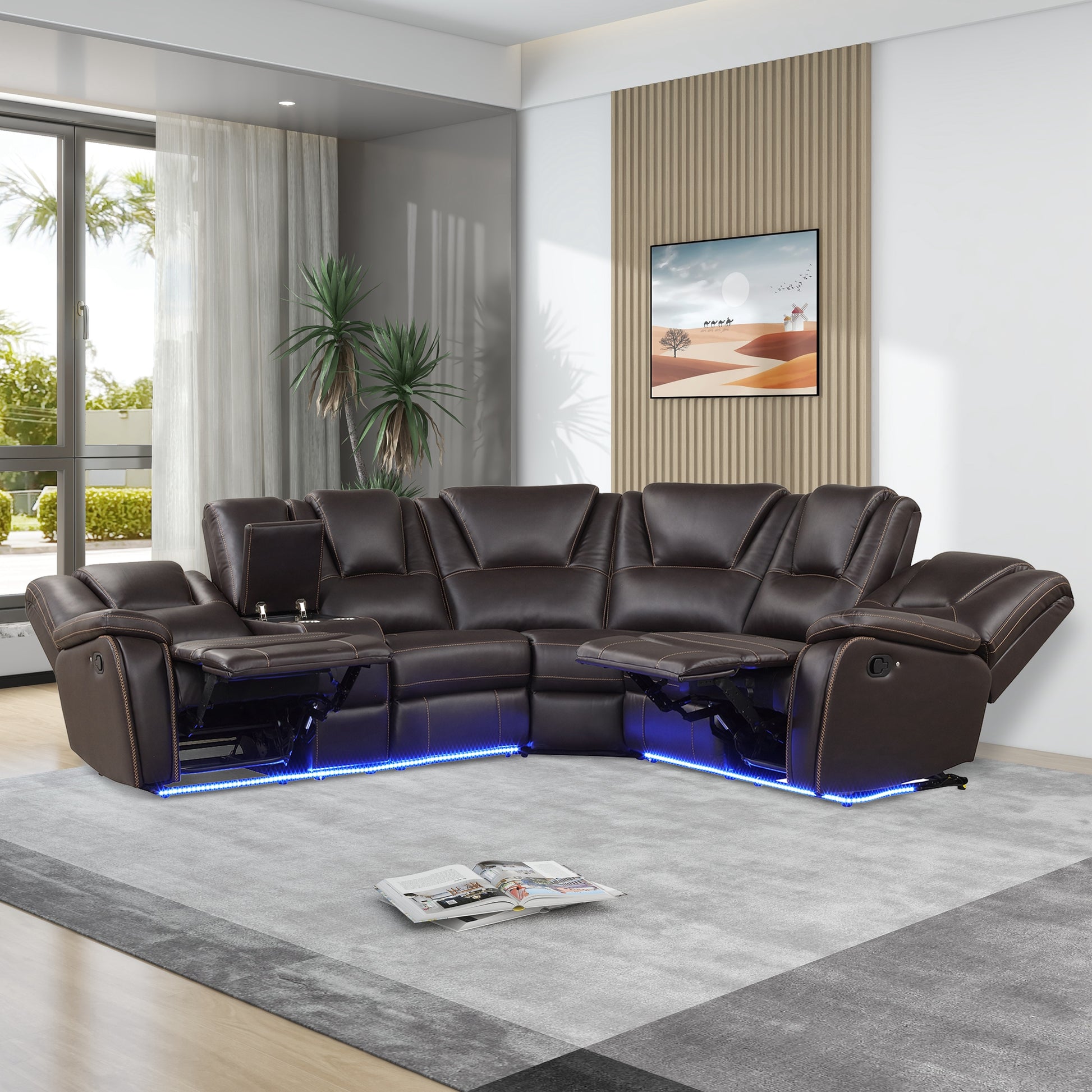 Luxurious dark brown leather sectional sofa with reclining seats and blue LED lighting