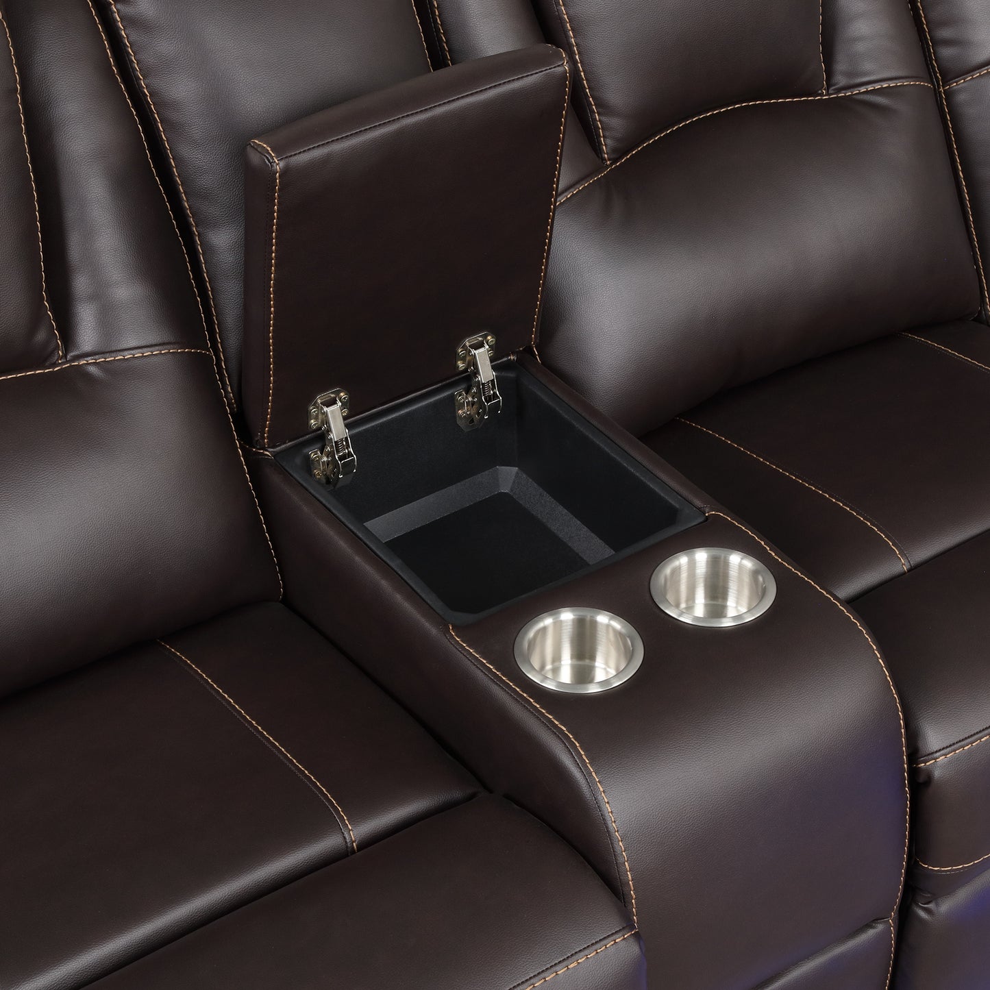 Brown leather recliner armrest with dual cup holders and hidden storage compartment