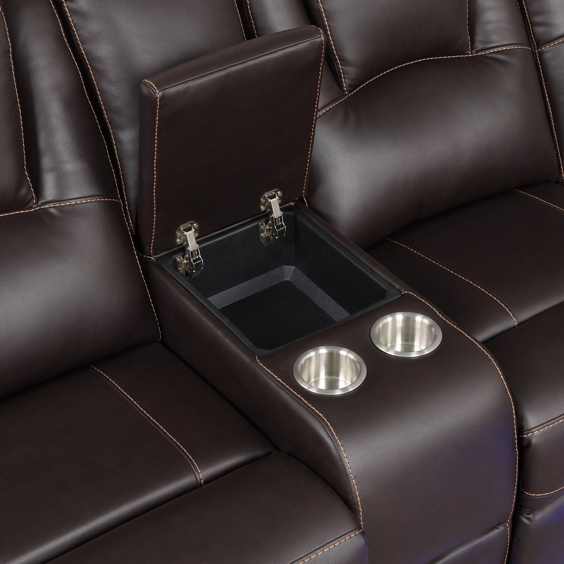 Brown leather recliner armrest with dual cup holders and hidden storage compartment