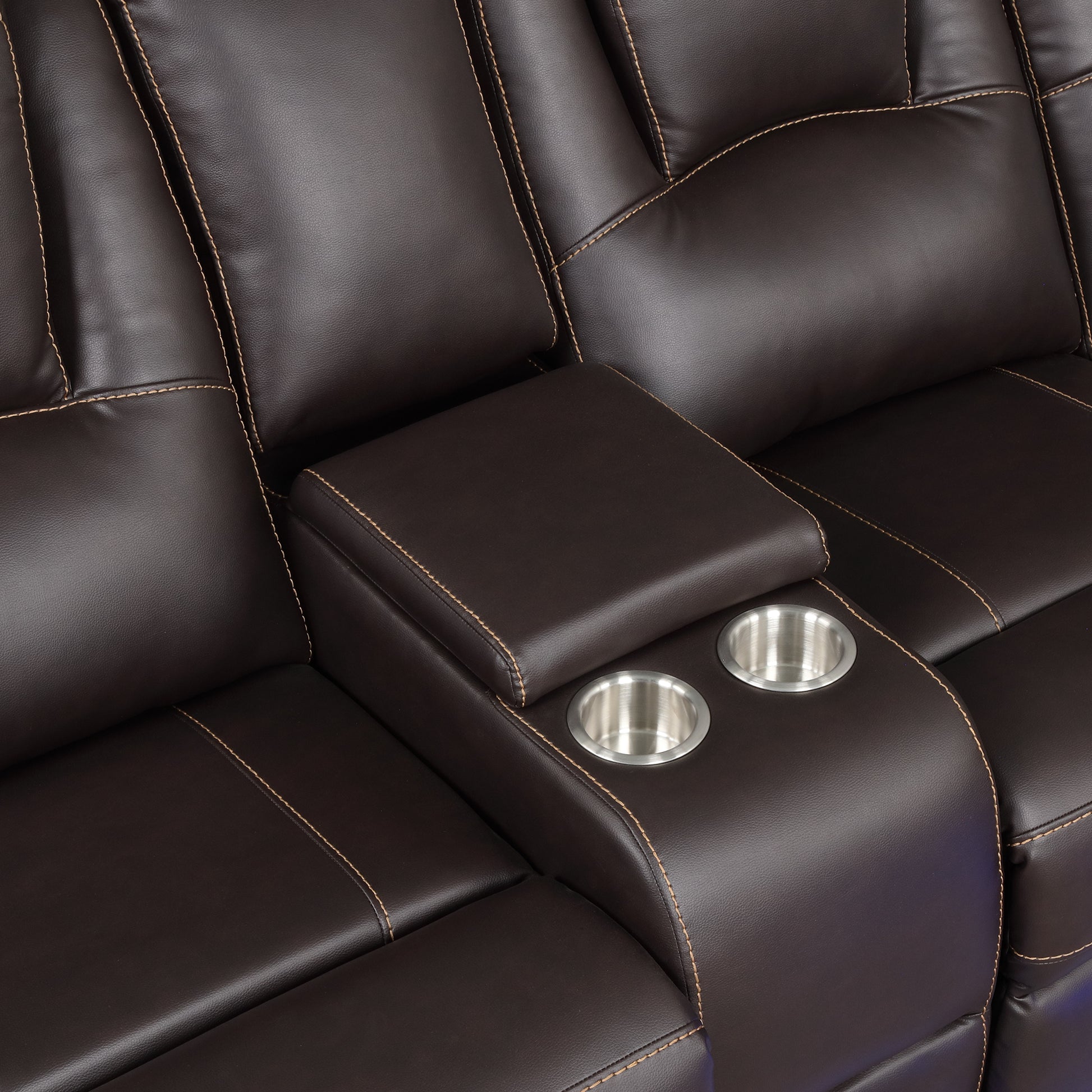 Dark brown leather recliner sofa with chrome cup holders and contrast stitching
