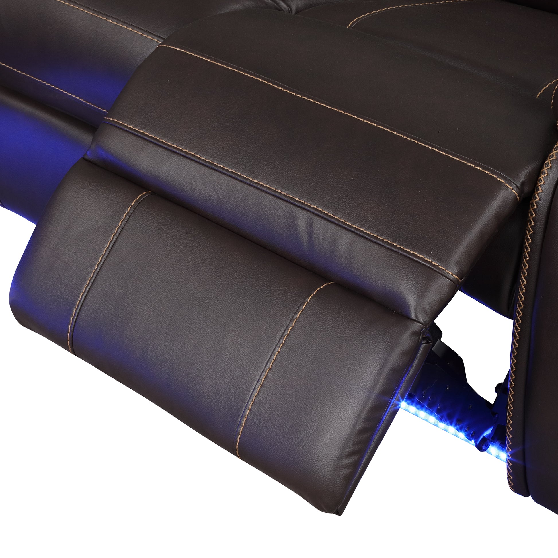 Close up of brown leather recliner with blue LED accent lighting and contrast stitching