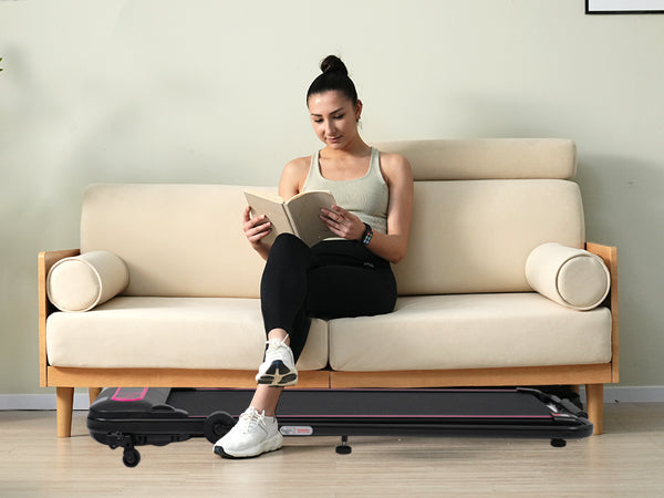 Compact black treadmill with pink accents perfect for home fitness
