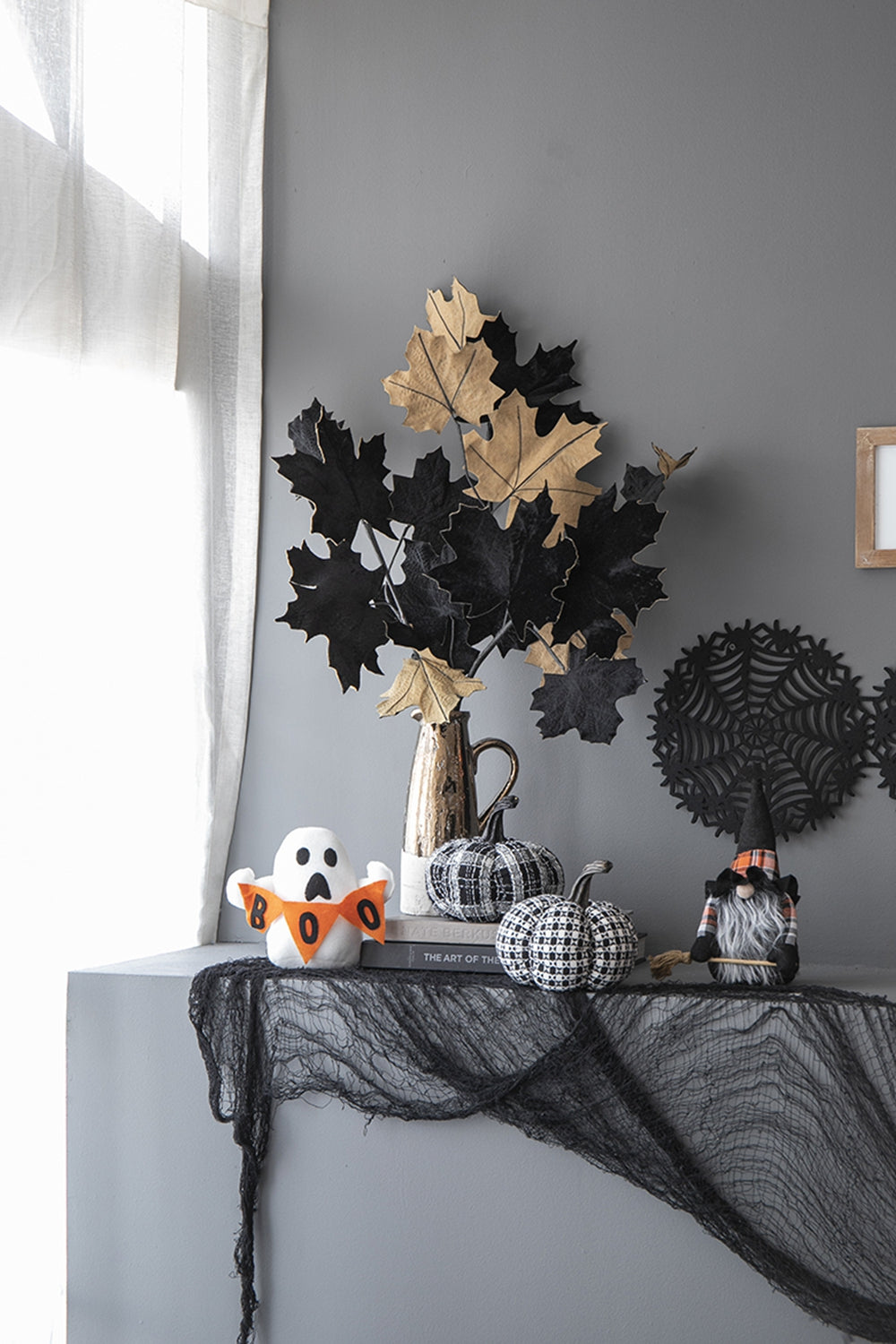 Halloween ghost plush with orange BOO banner ideal for spooky decor
