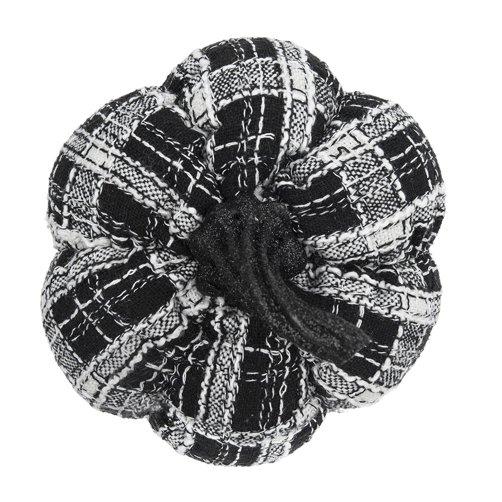 Black and white plaid fabric pumpkin decor with a textured stem