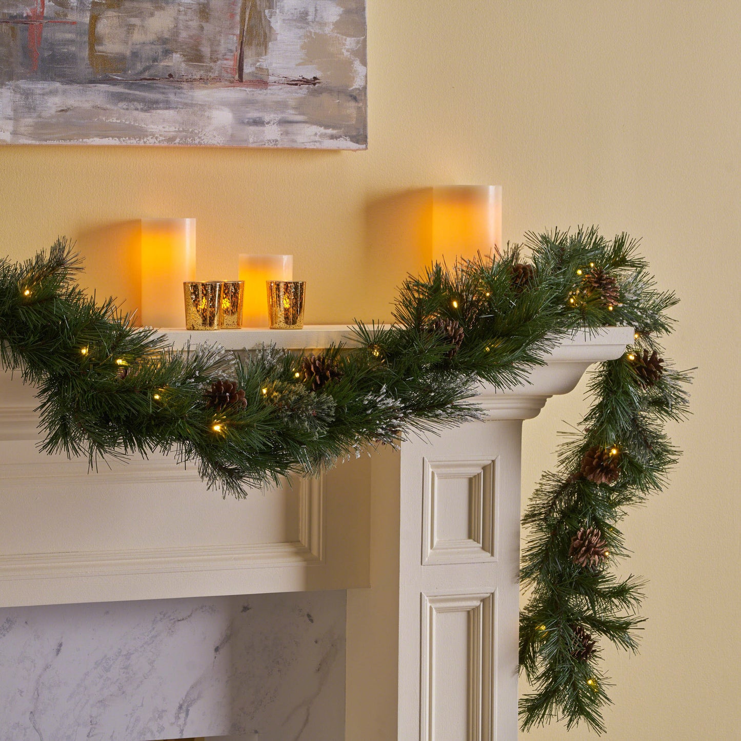 Prelit pine garland with warm white LED lights and pinecones perfect for holiday decorating