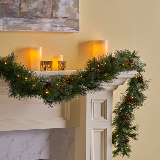 Prelit pine garland with warm white LED lights and pinecones perfect for holiday decorating