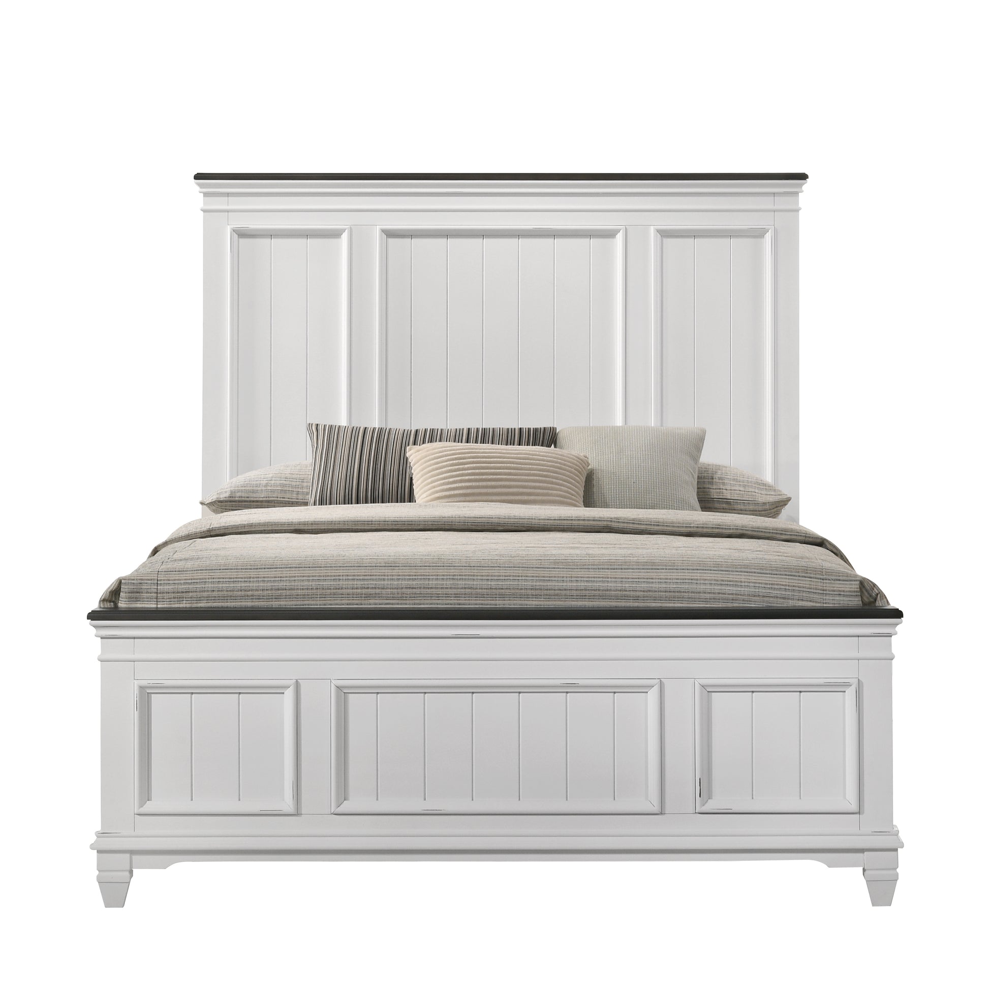 White panel headboard queen bed with upholstered mattress and decorative pillows