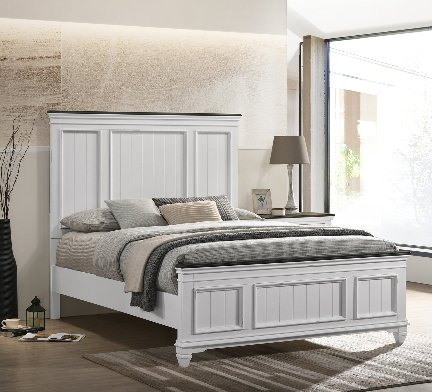 White panel headboard king size bed with textured pillows