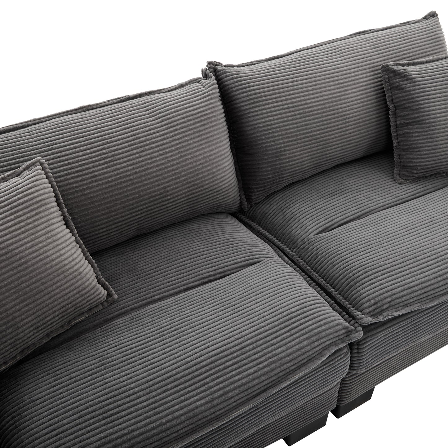 Deep grey corduroy sofa with plush cushions and modern design