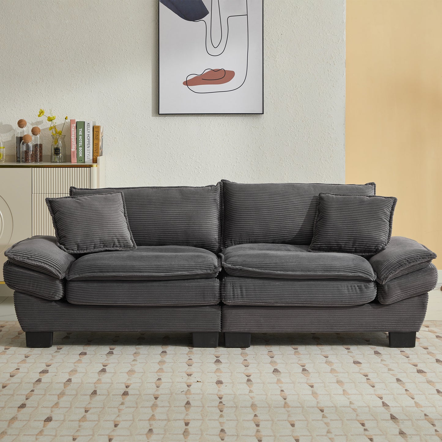 Dark gray corduroy sofa with plush cushions and deep seats for ultimate comfort