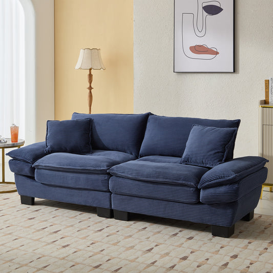 Navy blue corduroy sofa with plush cushions perfect for modern living rooms
