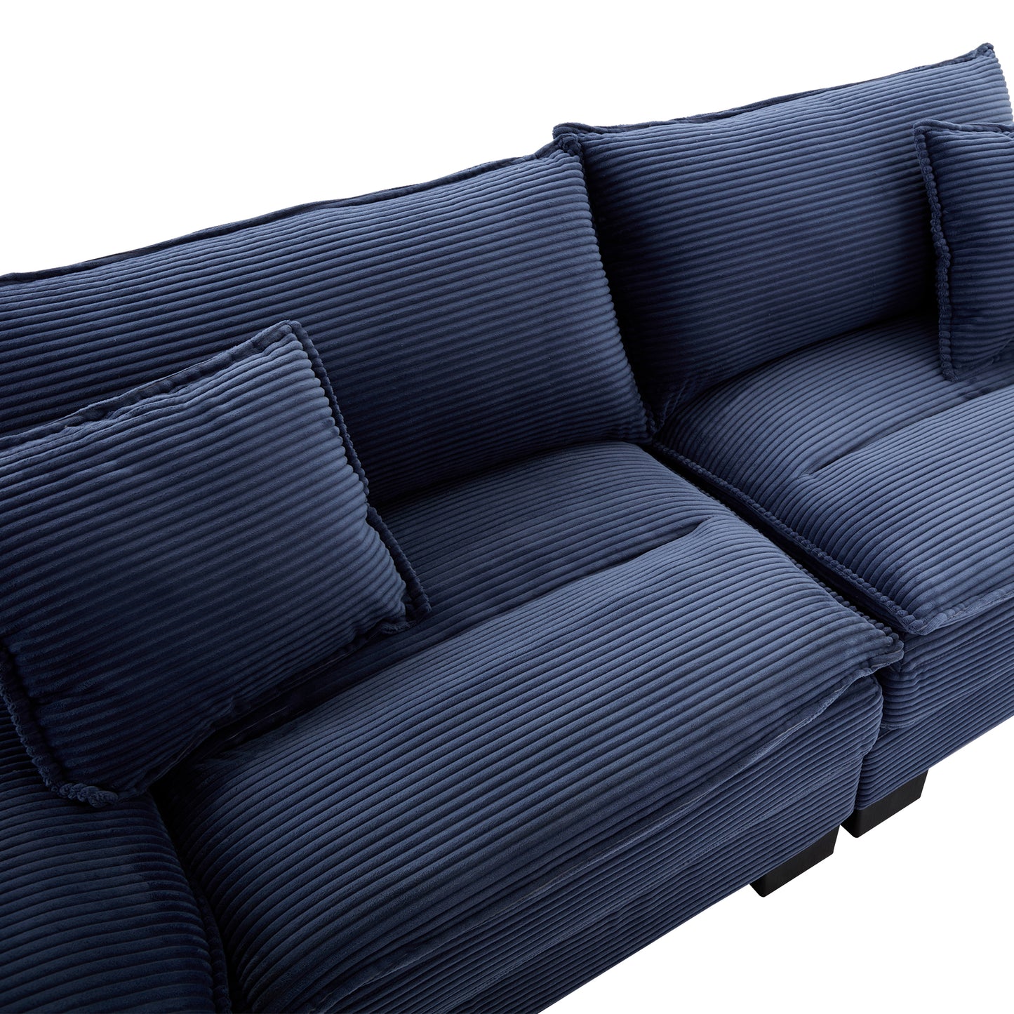 Deep navy blue corduroy sectional sofa with plush cushions and visible stitching