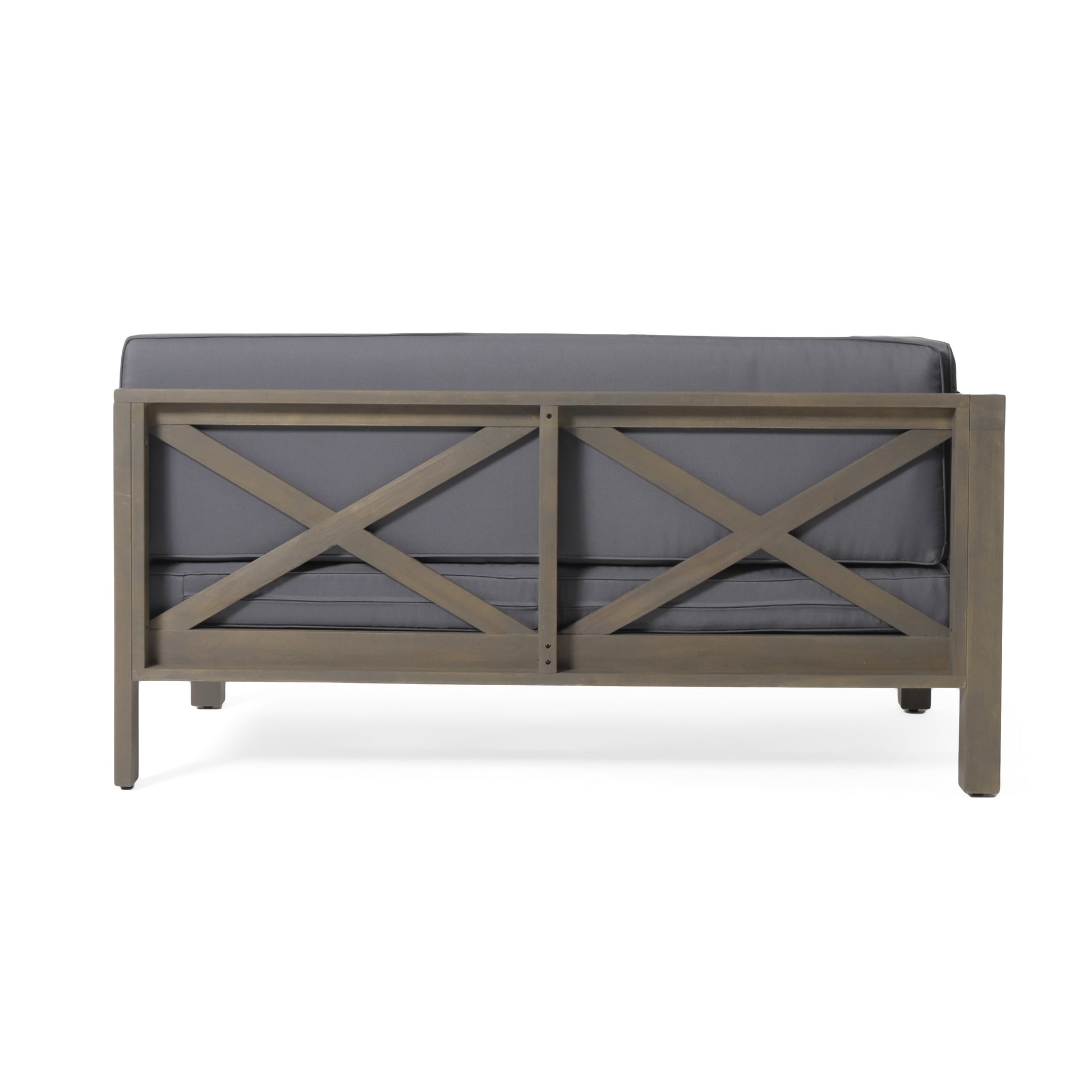 Gray upholstered outdoor sofa with weathered wood frame and Xdesign back