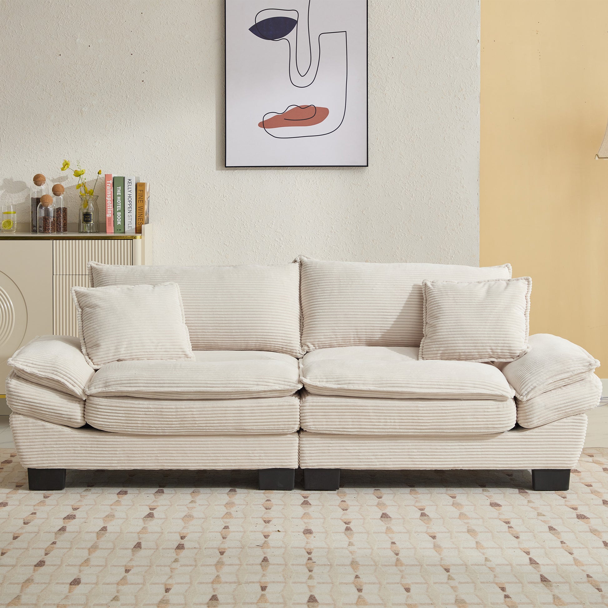 Plush cream corduroy sofa with deep cushions and matching throw pillows for ultimate comfort