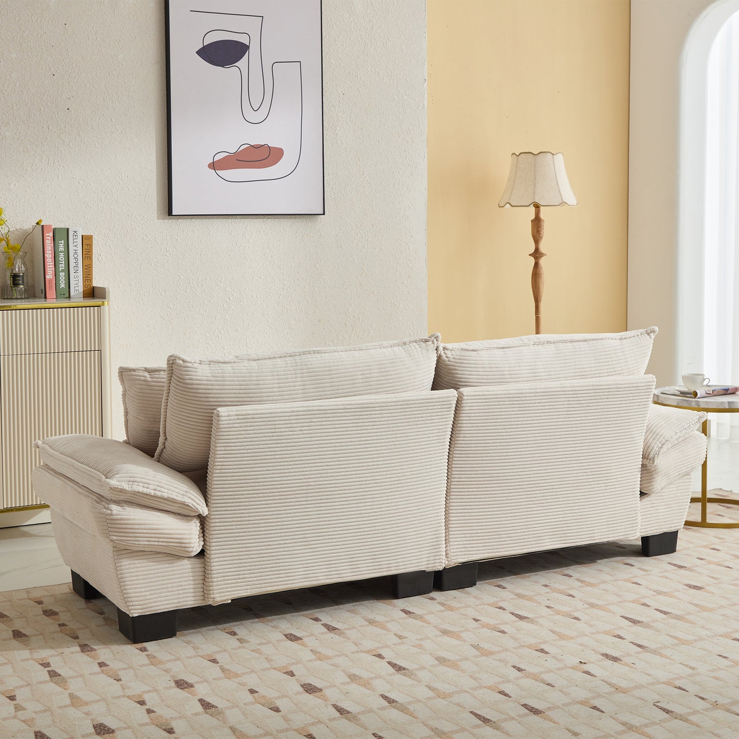 Cream corduroy sofa with deep cushions and plush texture ideal for living rooms