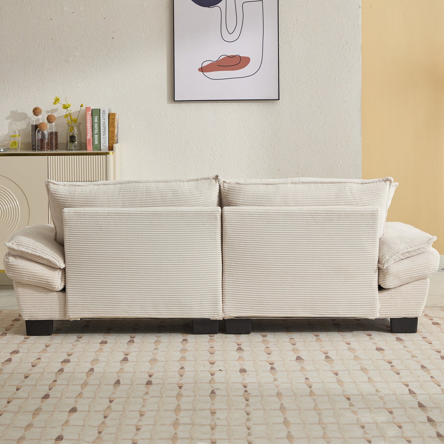 Plush cream corduroy sofa with thick ribbed texture and deep seat cushions