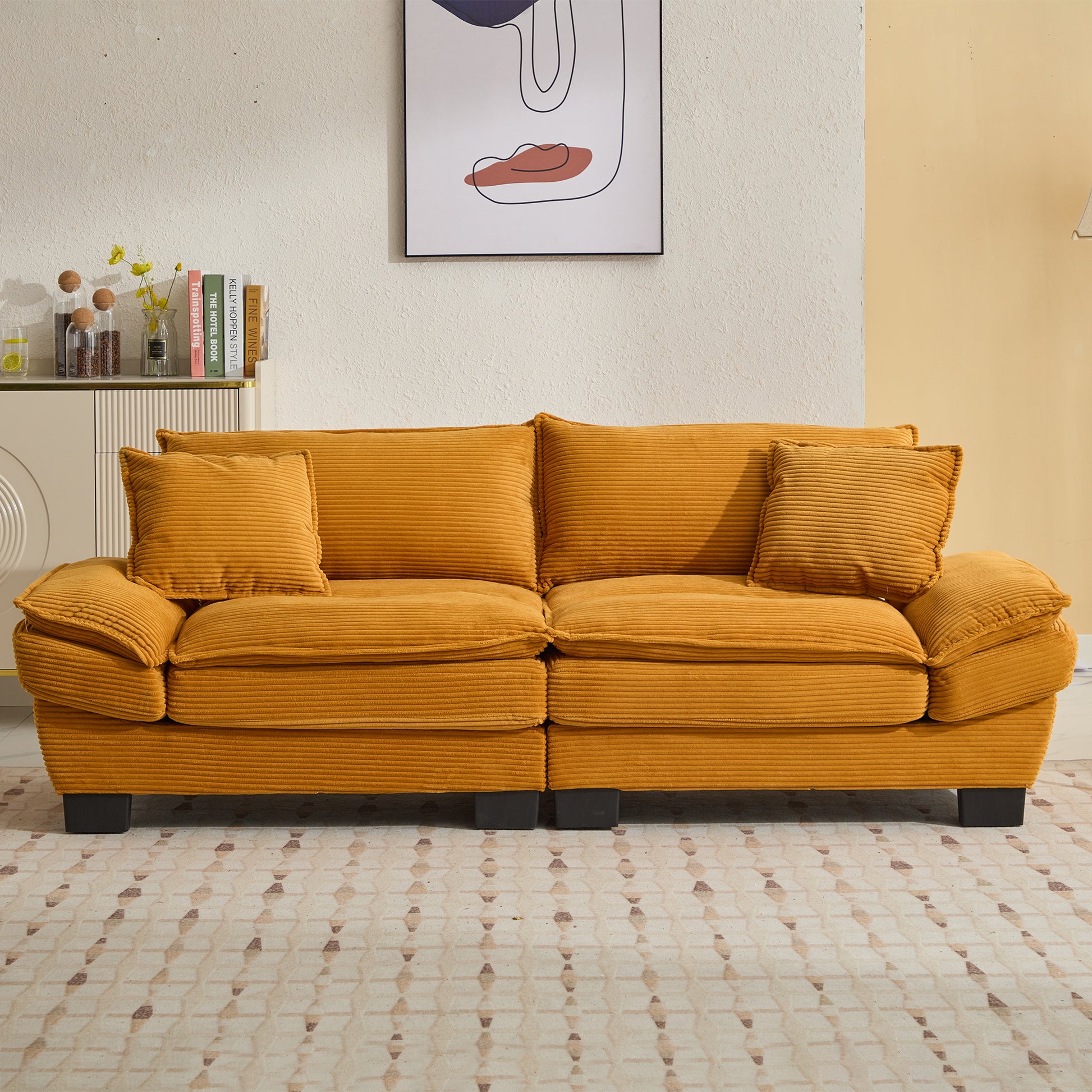 Orange corduroy sofa with plush cushions perfect for a cozy living room accent