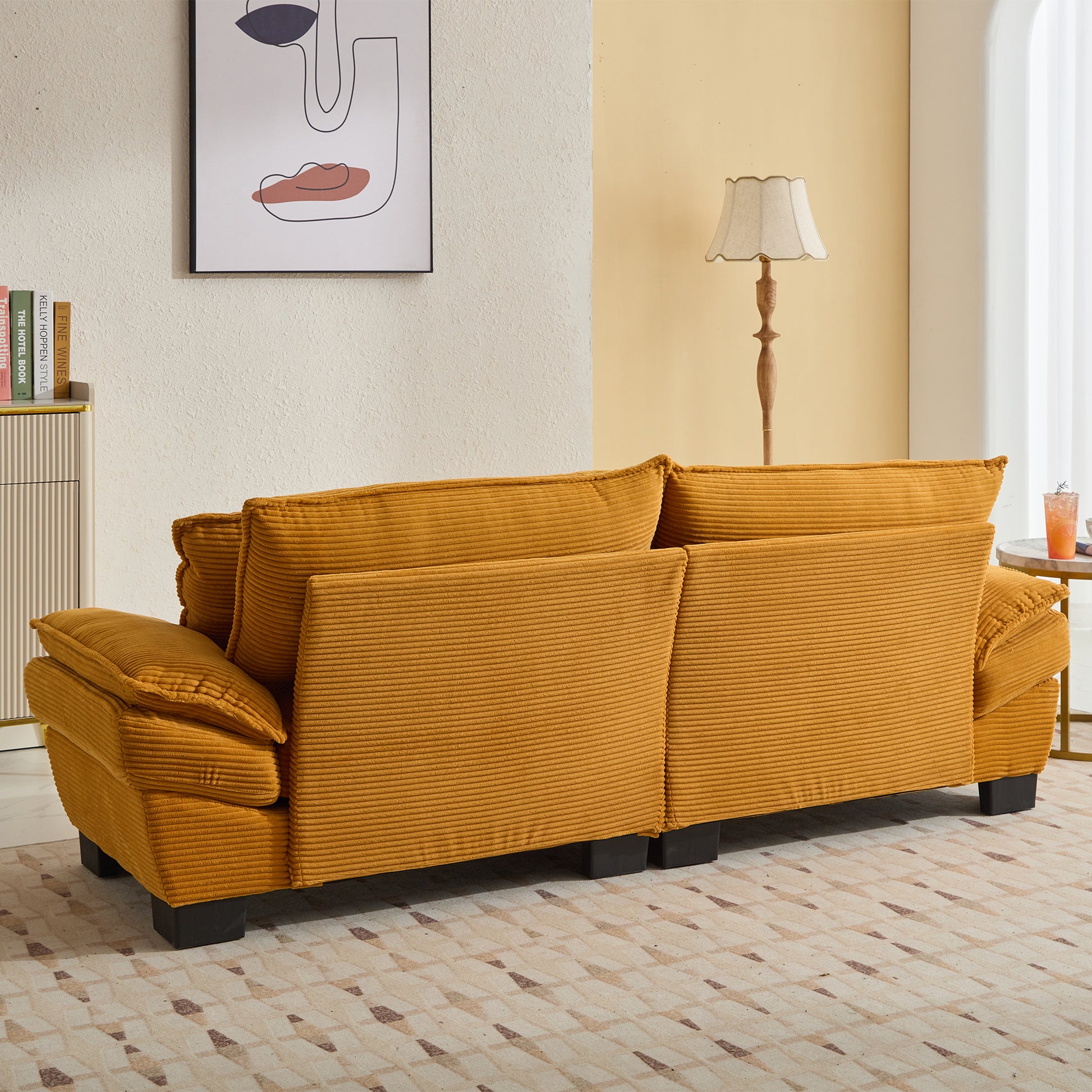 Ochre corduroy sofa with plush cushions perfect for modern living rooms