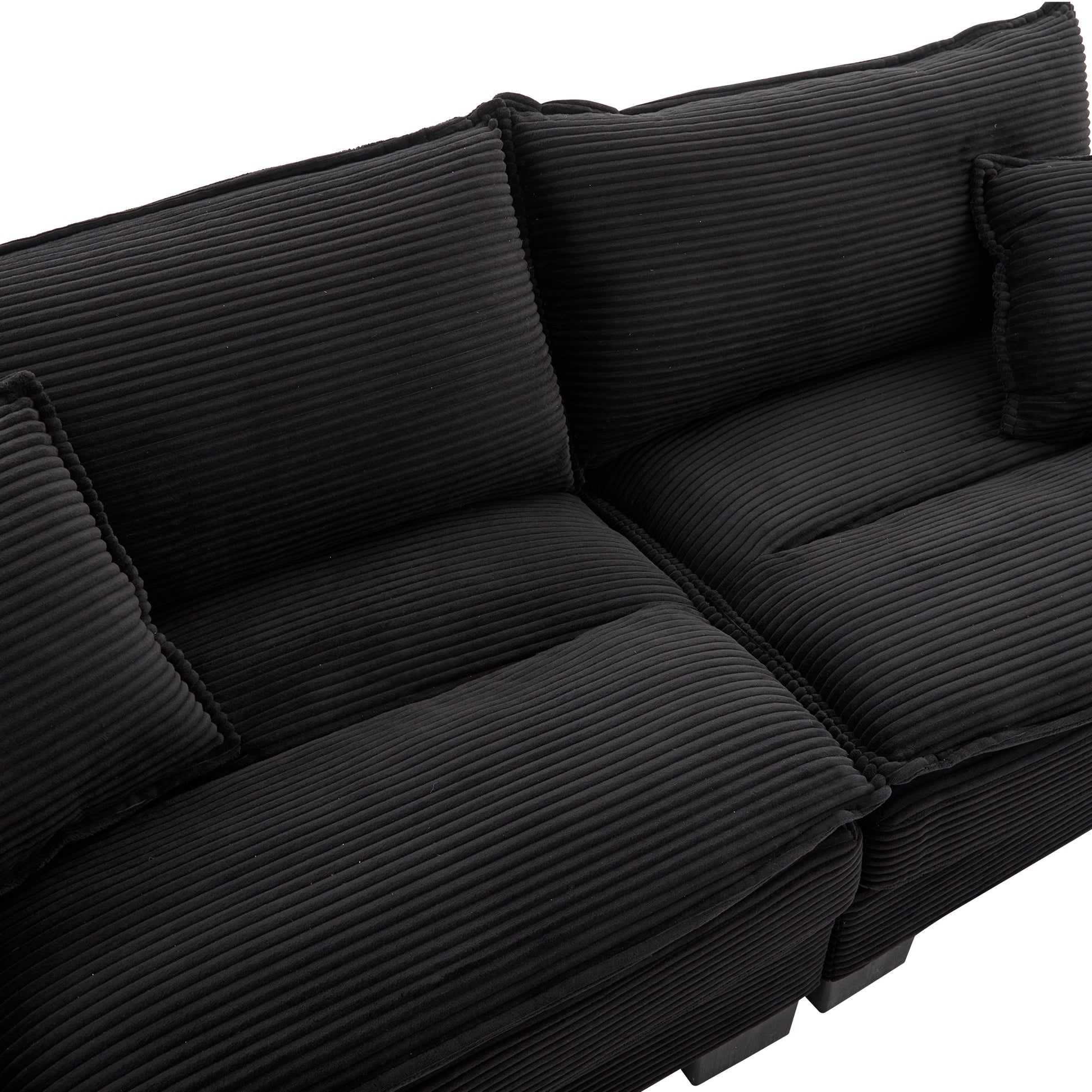 Black corduroy sectional sofa with plush cushions perfect for modern living rooms