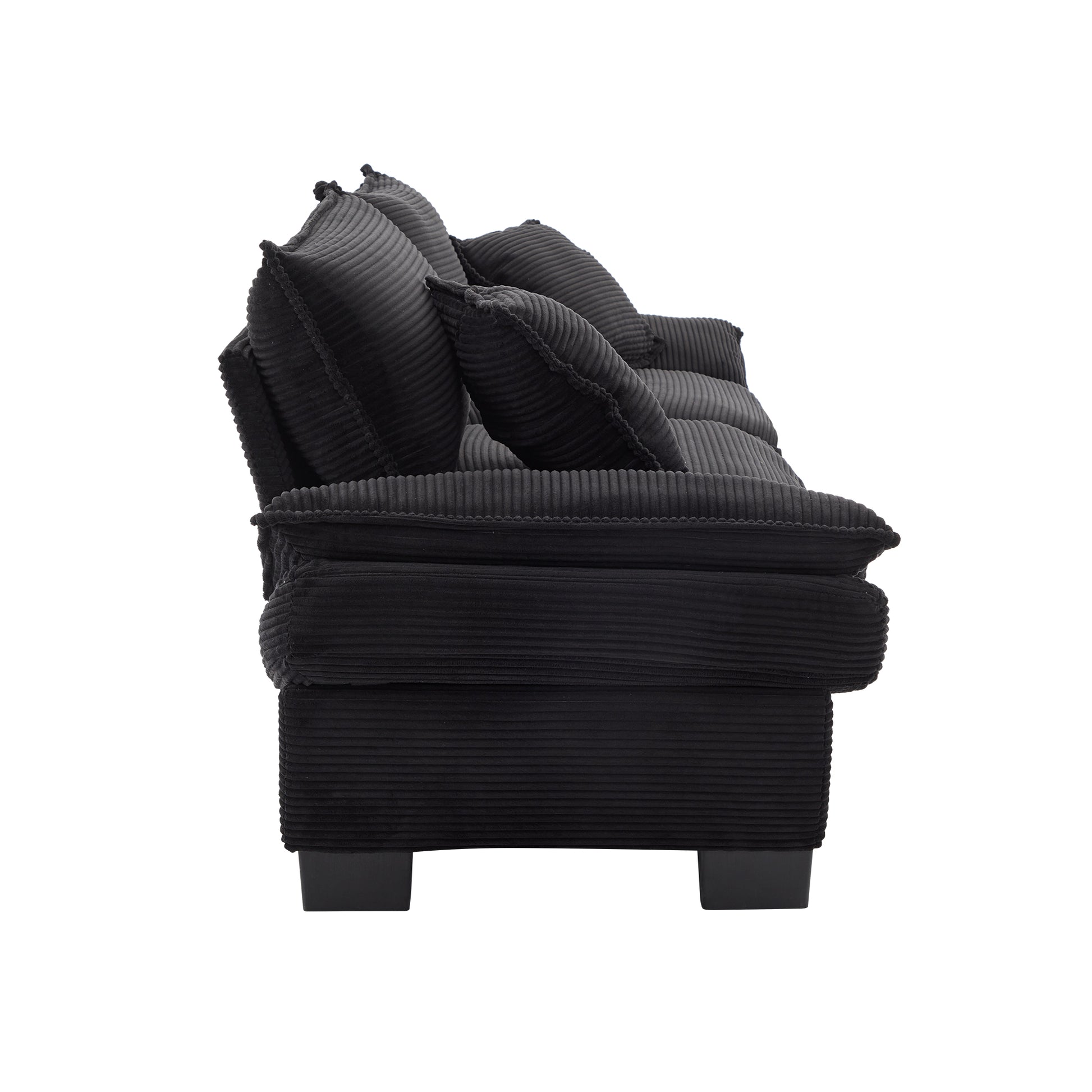 Black corduroy sofa with plush deep seats and multiple cushions