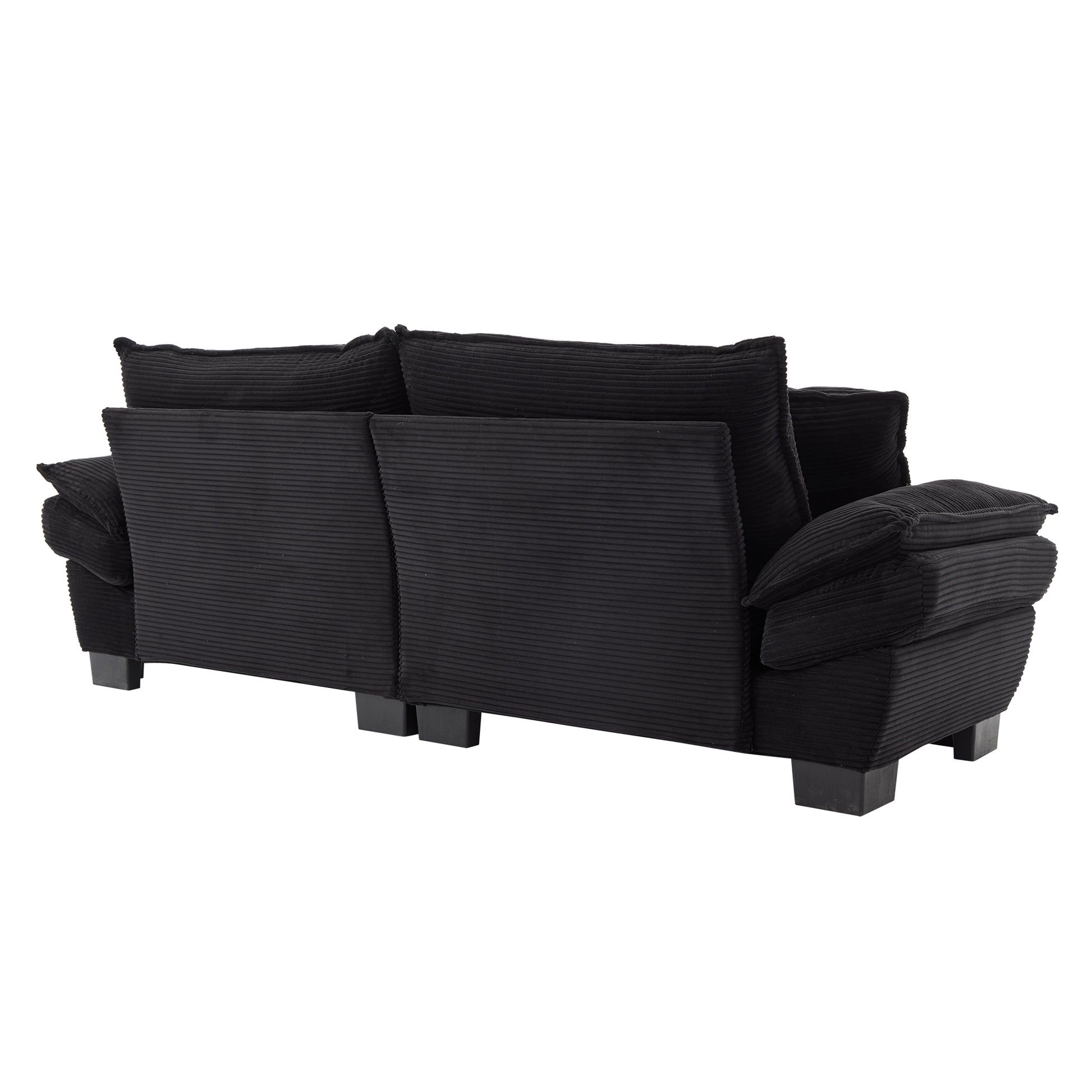 Black corduroy sofa with plush cushions and dark wooden block feet ideal for a modern living room