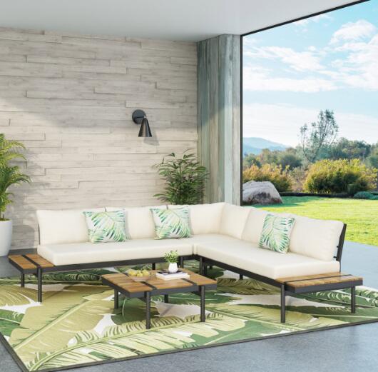 Outdoor sectional sofa with cream cushions and wood accents featuring a modern design for patio use