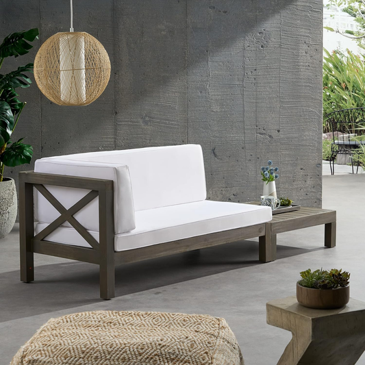 Gray wooden outdoor sectional sofa with crisp white cushions Xframe detailing and attached side table