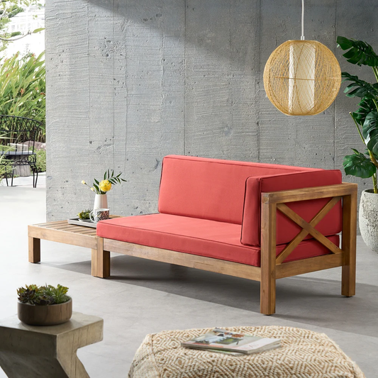 Red outdoor sectional sofa with wooden frame and attached side table