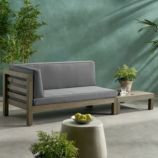 Modern grey outdoor loveseat with wood frame and comfortable cushions