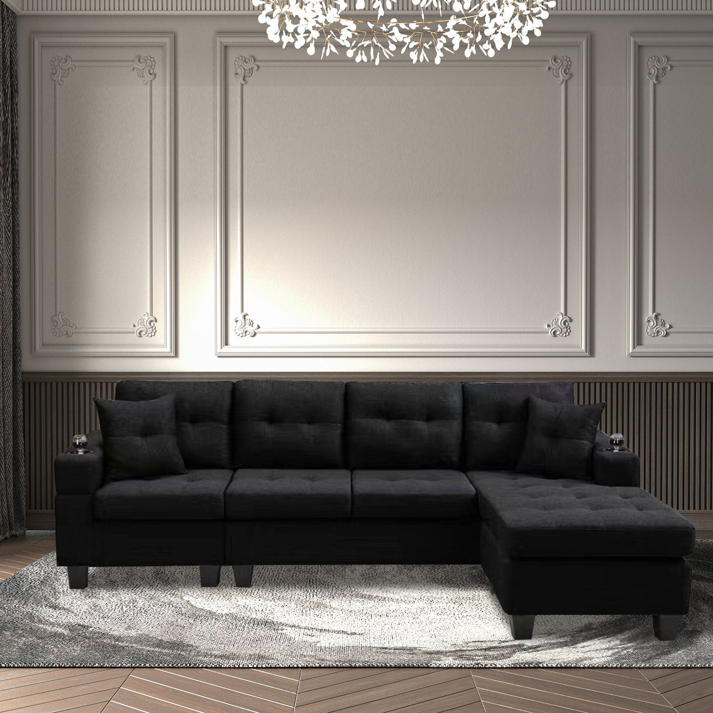 Black fabric sectional sofa with tufted cushions and builtin cup holders