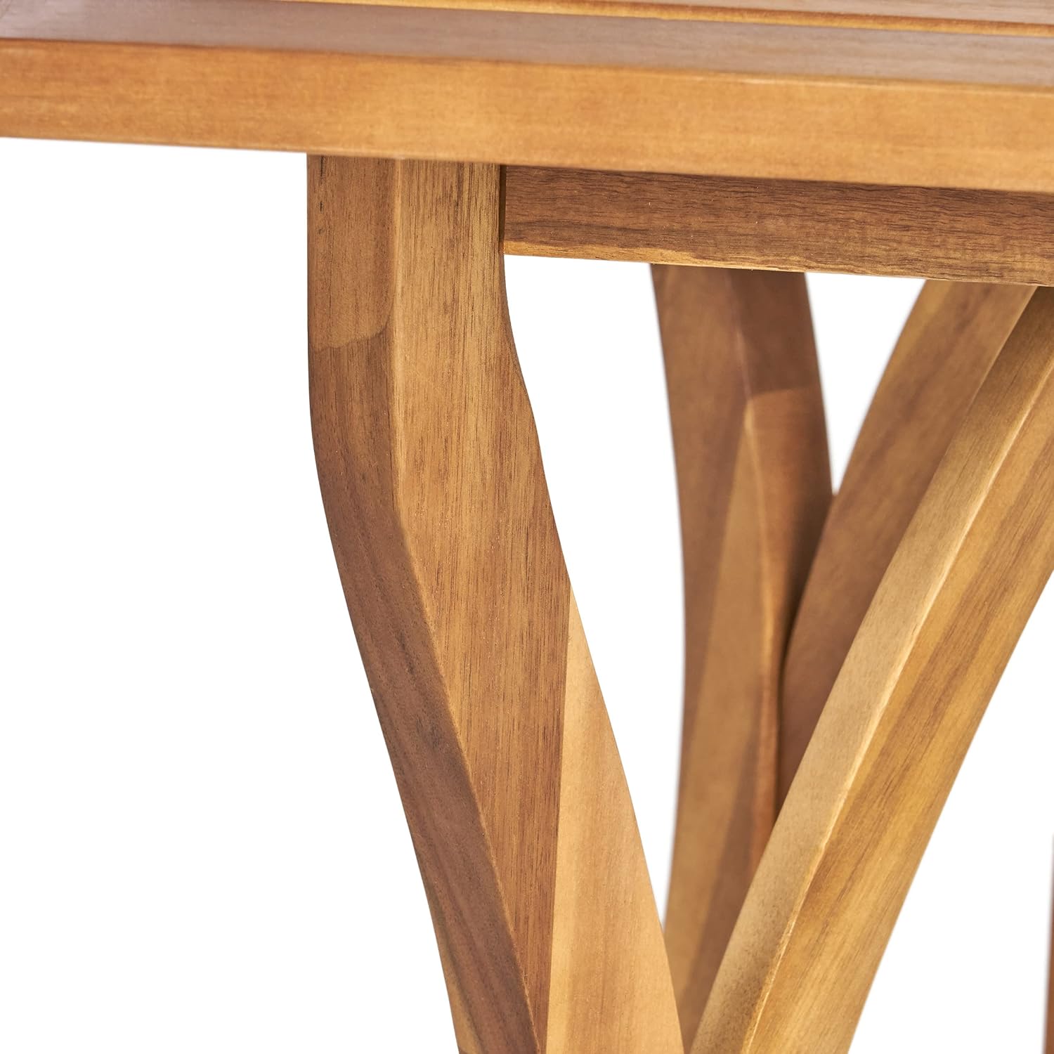 Closeup of natural wood table legs with curved design