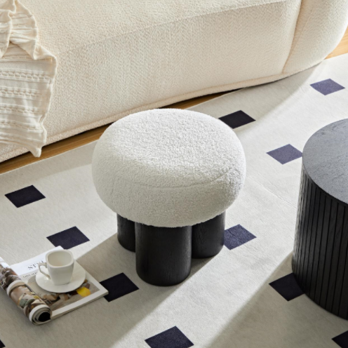 White boucle mushroom stool with black wooden legs modern accent piece